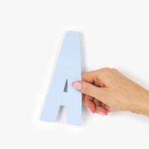 Hand Holding Letter From Custom Party Banner Decoration With Personalised Message