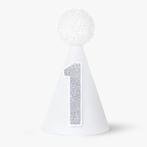 White Party Hat with Silver Glitter Number One on for Babys First Birthday Outfit